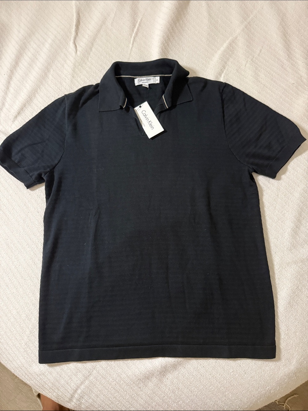 Calvin Klein Men’s Black Polo Shirt with Subtle Texture